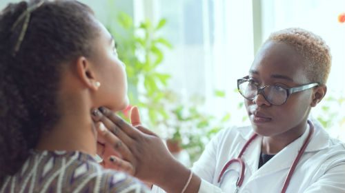 African American Female Doctor Examines Her, Health Channel